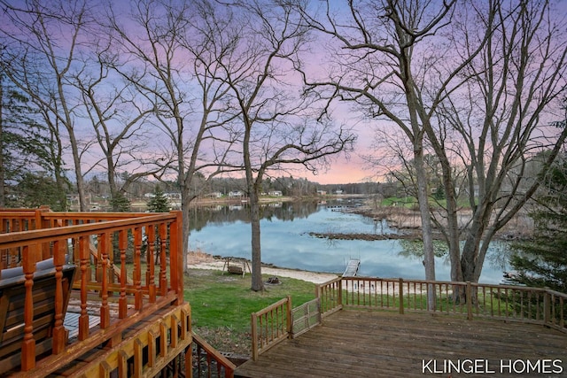 wooden deck with a water view