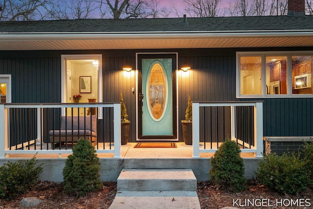 entrance to property with covered porch