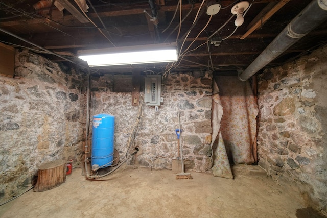 unfinished basement with electric panel