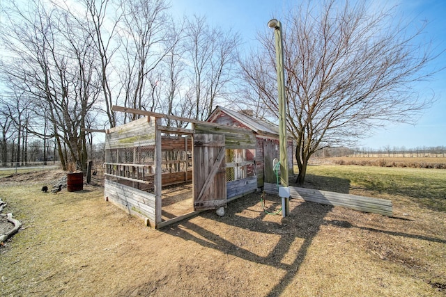 view of outbuilding with an outdoor structure