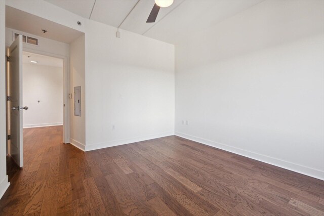 111 N Ashley St Unit 510, Ann Arbor, MI 48104 - unfurnished room featuring electric panel, baseboards, dark wood finished floors, and a ceiling fan