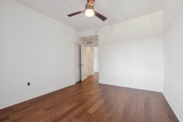 111 N Ashley St Unit 510, Ann Arbor, MI 48104 - empty room featuring dark wood finished floors, visible vents, ceiling fan, and baseboards