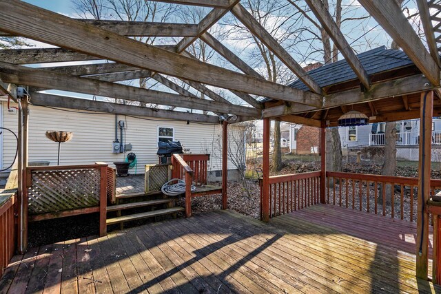 wooden terrace with a pergola