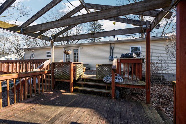wooden terrace with a pergola