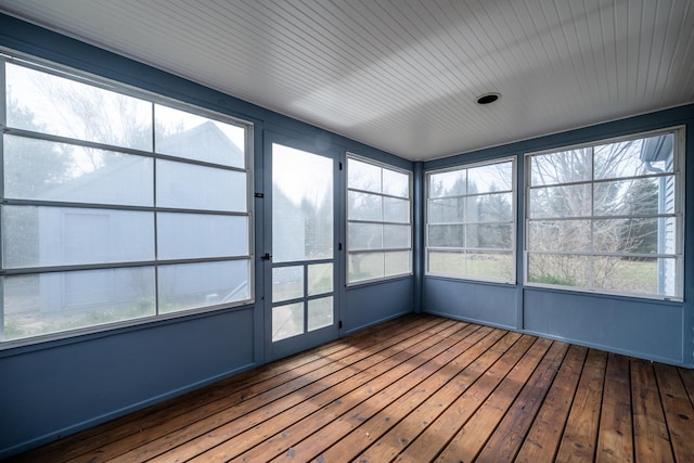 unfurnished sunroom featuring a healthy amount of sunlight