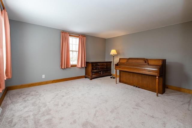 bedroom with baseboards and carpet floors