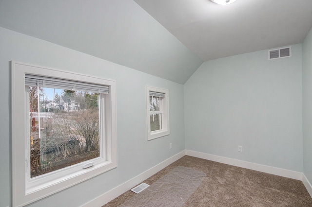 609 Lincoln Ave NW, Grand Rapids, MI 49504 - bonus room with vaulted ceiling and carpet