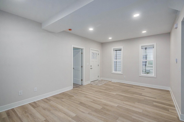 609 Lincoln Ave NW, Grand Rapids, MI 49504 - spare room featuring light wood finished floors and recessed lighting