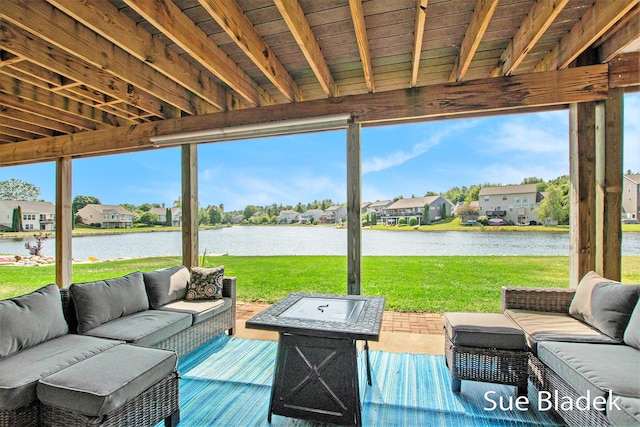 6735 Windflower Way, Norton Shores, MI 49444 - view of patio / terrace with an outdoor hangout area, a water view, and a residential view