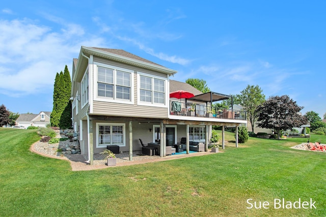 6735 Windflower Way, Norton Shores, MI 49444 - back of property featuring an outdoor hangout area, a yard, a patio, and a wooden deck