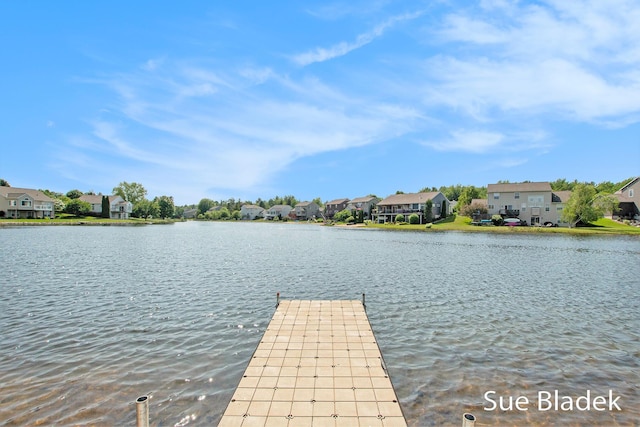 6735 Windflower Way, Norton Shores, MI 49444 - dock area featuring a residential view and a water view