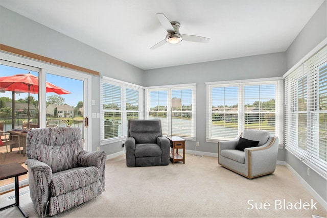 6735 Windflower Way, Norton Shores, MI 49444 - sunroom / solarium featuring carpet floors and a water view