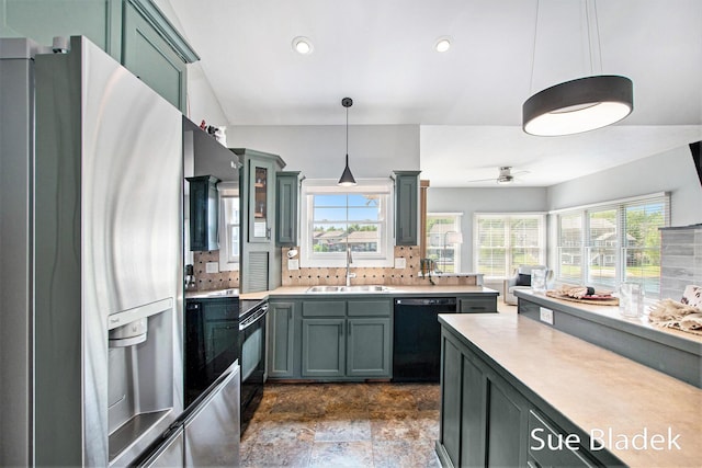 6735 Windflower Way, Norton Shores, MI 49444 - kitchen with black appliances, light countertops, healthy amount of natural light, and recessed lighting