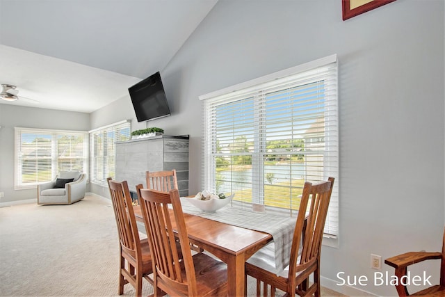 6735 Windflower Way, Norton Shores, MI 49444 - dining area featuring carpet flooring and lofted ceiling