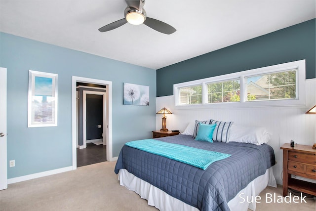6735 Windflower Way, Norton Shores, MI 49444 - carpeted bedroom with a ceiling fan and baseboards