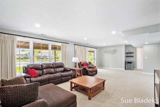 6735 Windflower Way, Norton Shores, MI 49444 - living room with light colored carpet and recessed lighting