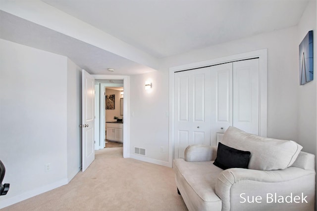 6735 Windflower Way, Norton Shores, MI 49444 - living area with light colored carpet and baseboards