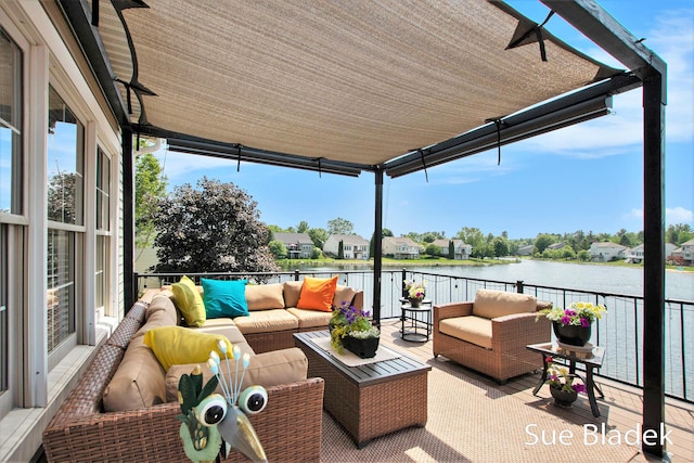 6735 Windflower Way, Norton Shores, MI 49444 - patio / terrace featuring a water view and an outdoor hangout area