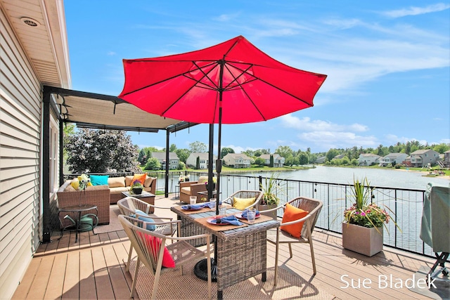 6735 Windflower Way, Norton Shores, MI 49444 - deck featuring outdoor lounge area and a water view