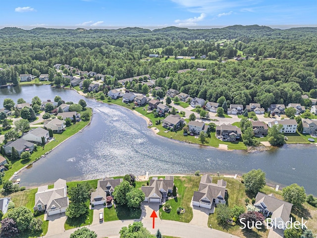 6735 Windflower Way, Norton Shores, MI 49444 - aerial perspective of suburban area featuring a large body of water