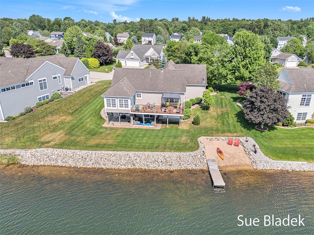 6735 Windflower Way, Norton Shores, MI 49444 - aerial view of residential area featuring a large body of water