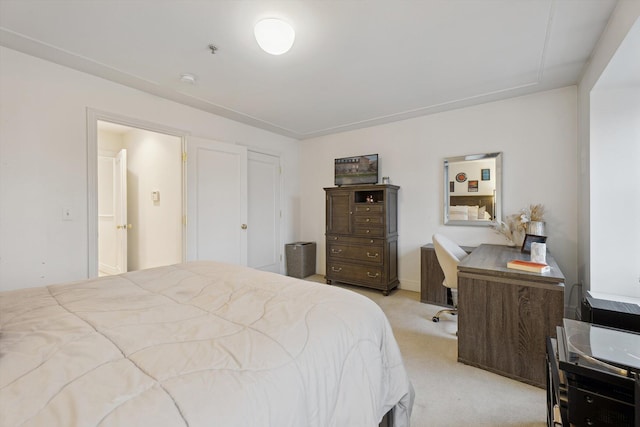 bedroom featuring light colored carpet