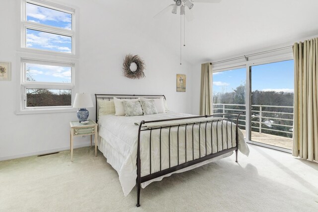 2019 Silvertip Ln, Long Beach, IN 46360 - carpeted bedroom with visible vents, multiple windows, a ceiling fan, and access to outside
