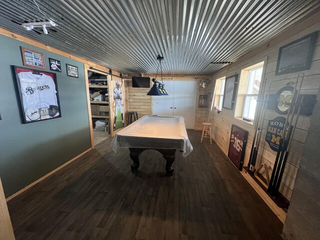 2772 S Wisner Ave, Fremont, MI 49412 - game room with dark wood finished floors, billiards, and wooden walls