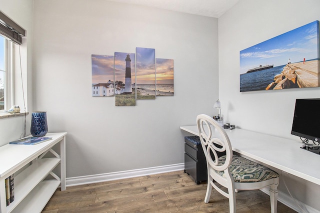 401 W Ludington Ave Unit 208, Ludington, MI 49431 - office featuring baseboards and wood finished floors