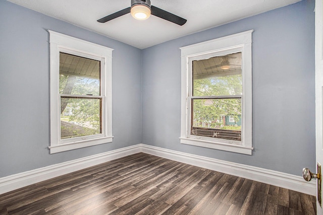 176 N Union St, Battle Creek, MI 49017 - unfurnished room with plenty of natural light, dark wood-style floors, baseboards, and ceiling fan