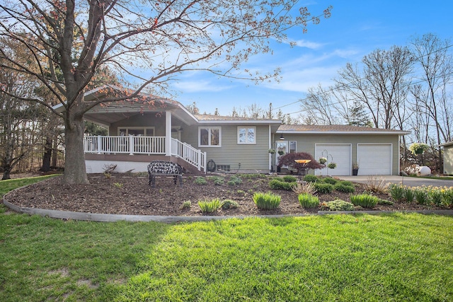 view of front facade with a porch, a front lawn, concrete driveway, and a garage