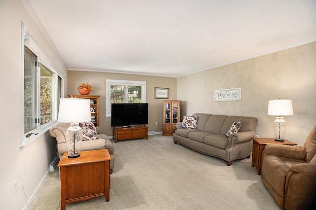 living area with light colored carpet, baseboards, and crown molding
