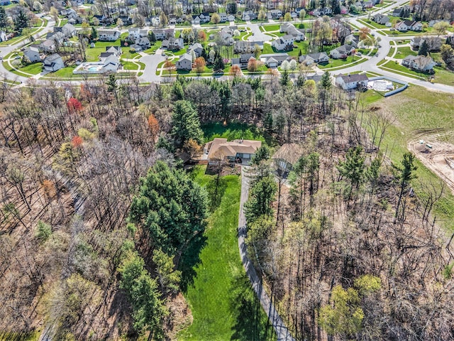 aerial view of property's location featuring nearby suburban area