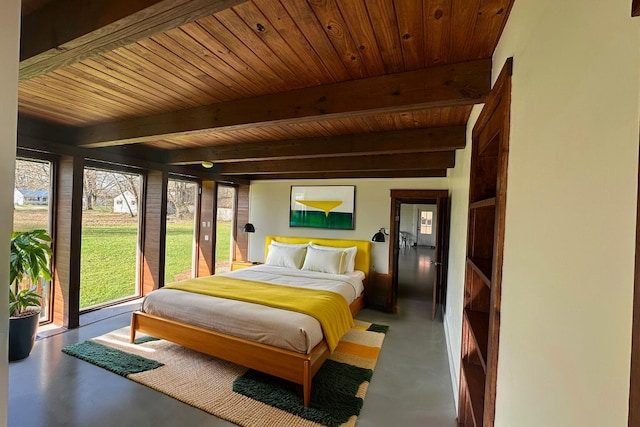 426 Elizabeth St, Buchanan, MI 49107 - bedroom featuring concrete floors, wooden ceiling, and beamed ceiling