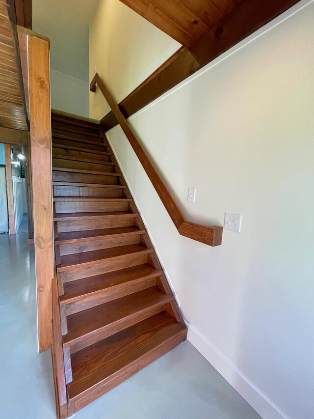 426 Elizabeth St, Buchanan, MI 49107 - stairs with concrete flooring and baseboards