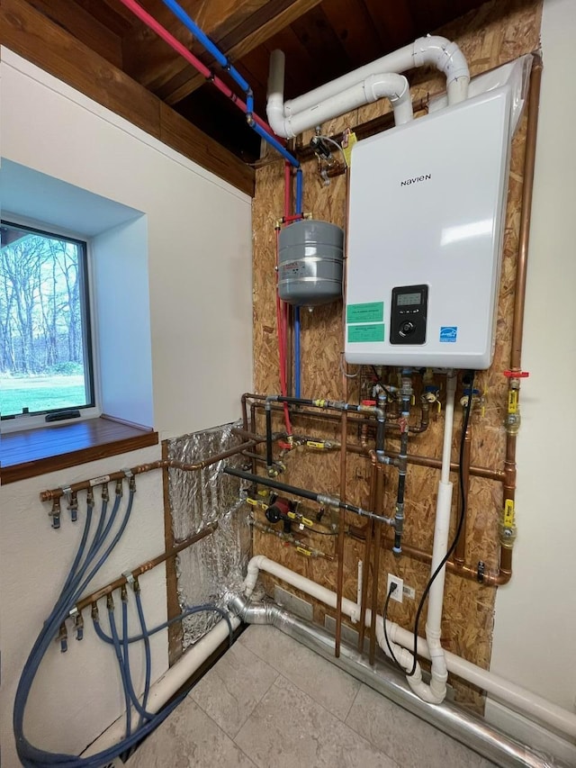 426 Elizabeth St, Buchanan, MI 49107 - utility room featuring water heater