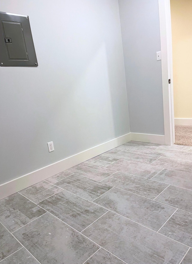 426 Elizabeth St, Buchanan, MI 49107 - unfurnished room featuring baseboards and electric panel