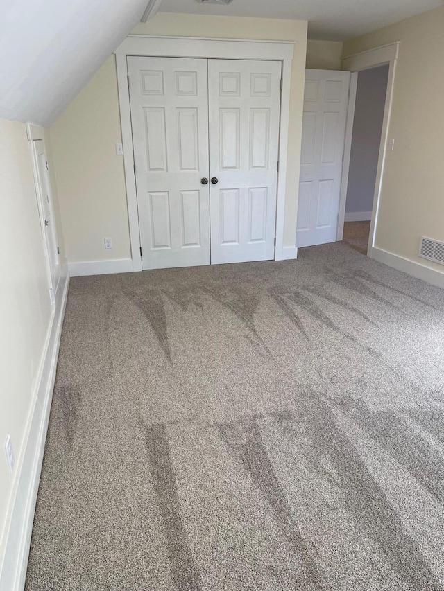 426 Elizabeth St, Buchanan, MI 49107 - unfurnished bedroom with a closet, carpet flooring, visible vents, and baseboards