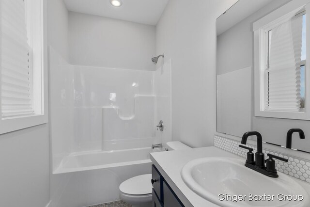 5560 Albright Ave SW Unit 67, Wyoming, MI 49418 - bathroom with bathtub / shower combination, toilet, and vanity