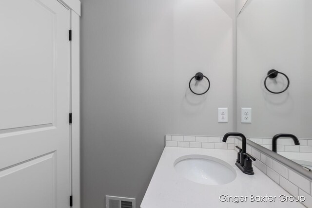 5560 Albright Ave SW Unit 67, Wyoming, MI 49418 - bathroom with vanity and visible vents