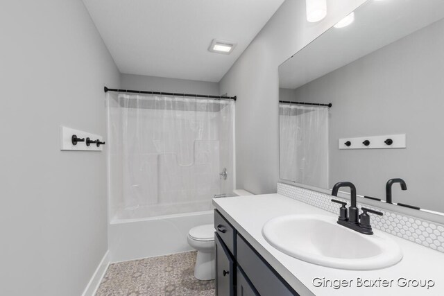 5560 Albright Ave SW Unit 67, Wyoming, MI 49418 - full bathroom with toilet, vanity, and shower / bath combo