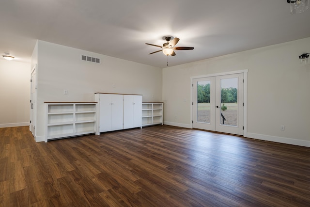 3935 W Destiny Dr, Hart, MI 49420 - empty room with visible vents, dark wood finished floors, french doors, baseboards, and ceiling fan