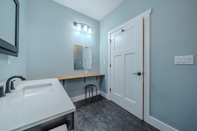 3935 W Destiny Dr, Hart, MI 49420 - bathroom with vanity and baseboards