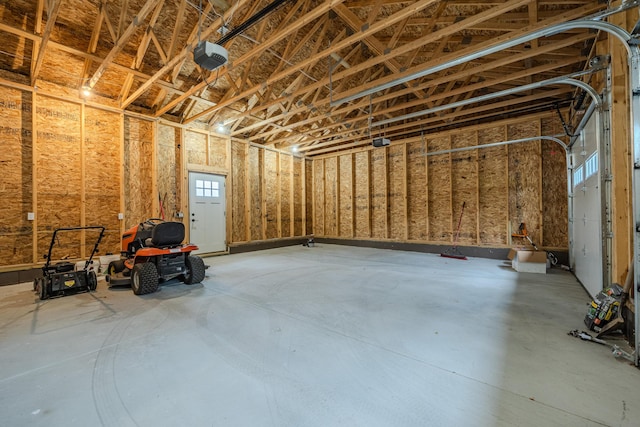 3935 W Destiny Dr, Hart, MI 49420 - garage featuring a garage door opener