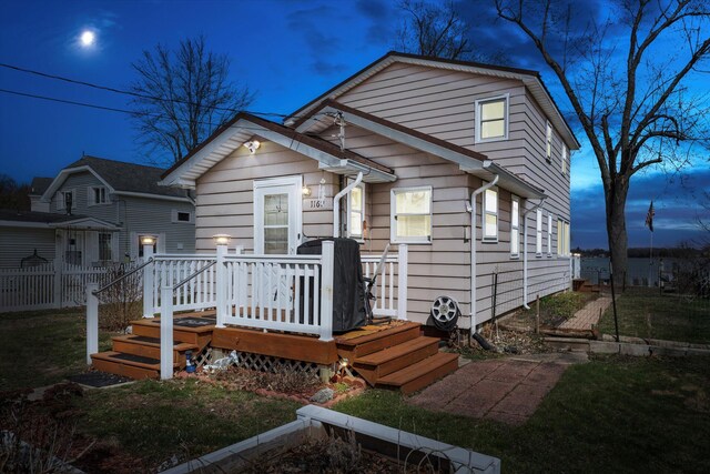 1169 Shady Shores Dr, Niles, MI 49120 - view of front facade with a deck and fence