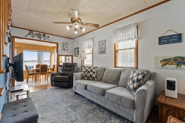 1169 Shady Shores Dr, Niles, MI 49120 - living area with wood finished floors, ceiling fan, and ornamental molding