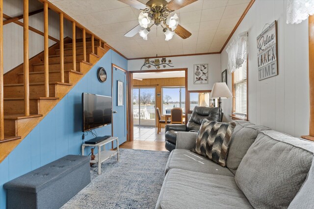 1169 Shady Shores Dr, Niles, MI 49120 - living area with wood finished floors, stairway, a ceiling fan, and ornamental molding