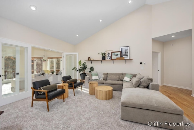7834 Strawberry Ln NE, Belmont, MI 49306 - living area featuring recessed lighting, baseboards, high vaulted ceiling, and wood finished floors