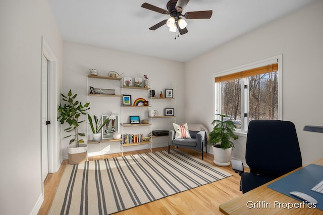 7834 Strawberry Ln NE, Belmont, MI 49306 - office with baseboards, ceiling fan, and wood finished floors