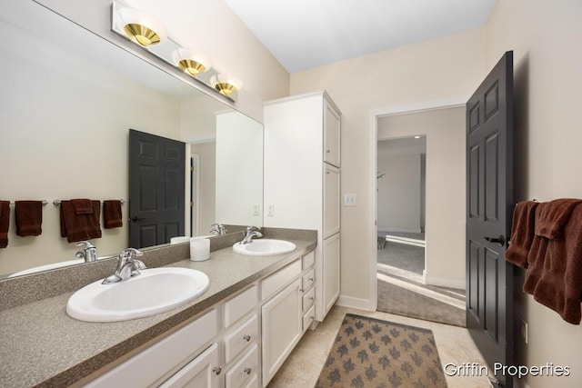 7834 Strawberry Ln NE, Belmont, MI 49306 - full bath with double vanity and a sink